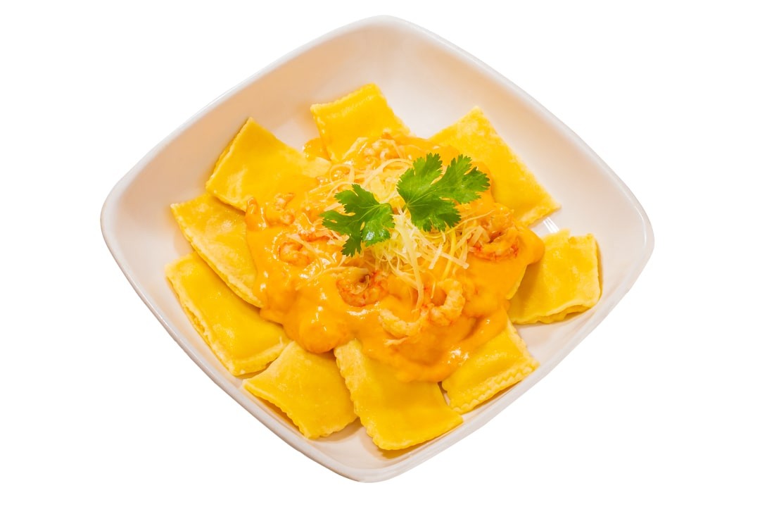 Agnolotti con Salsa de Camarón